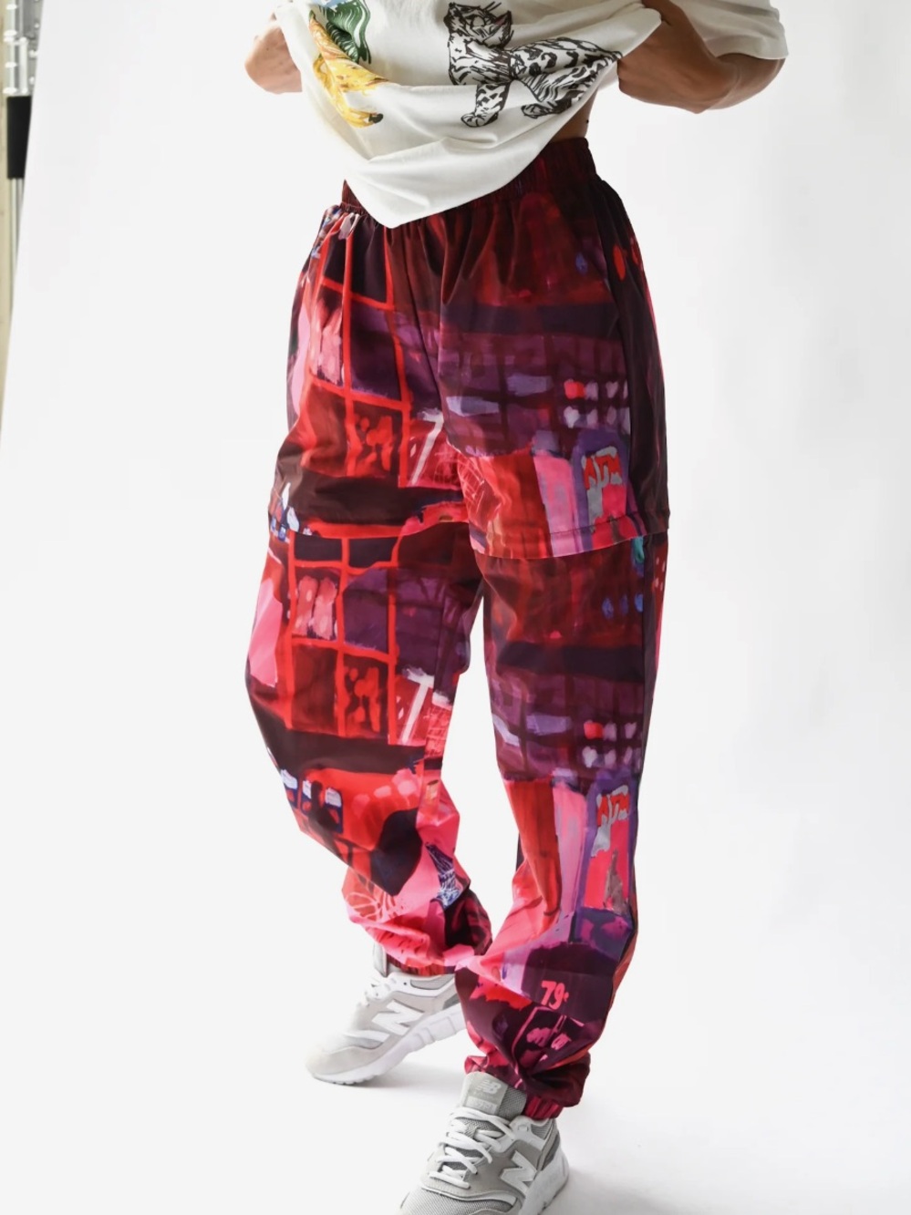 yLLW women’s Red Abstract Print Track Pants